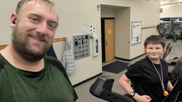 Mark and I on the treadmill at the gym. 